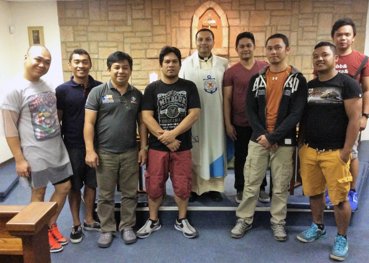 Fr Herman AoS Durban with some of the crew of Seroja Lima at Mass