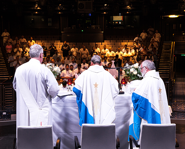 Bishop Joseph Kalathiparambil, Fr Bruno Ciceri and Rev Roger Stone from AoS  celebrate Mass on board mv Britannia 