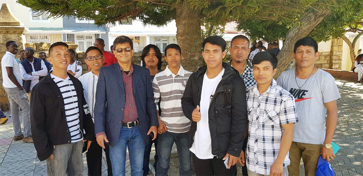 Nicholas and Fr Rico with seafarers at St Agnes Church Woodstock